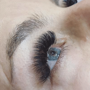 Finished eyelash extensions adding subtle length and fullness.