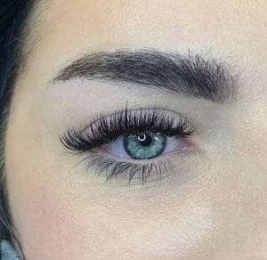 Eyelash extensions creating a fuller lash line with natural definition.